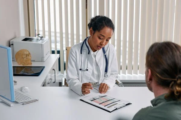 RCM for Multi-Specialty Clinics: What You Need to Know Doctor reviewing medical billing records